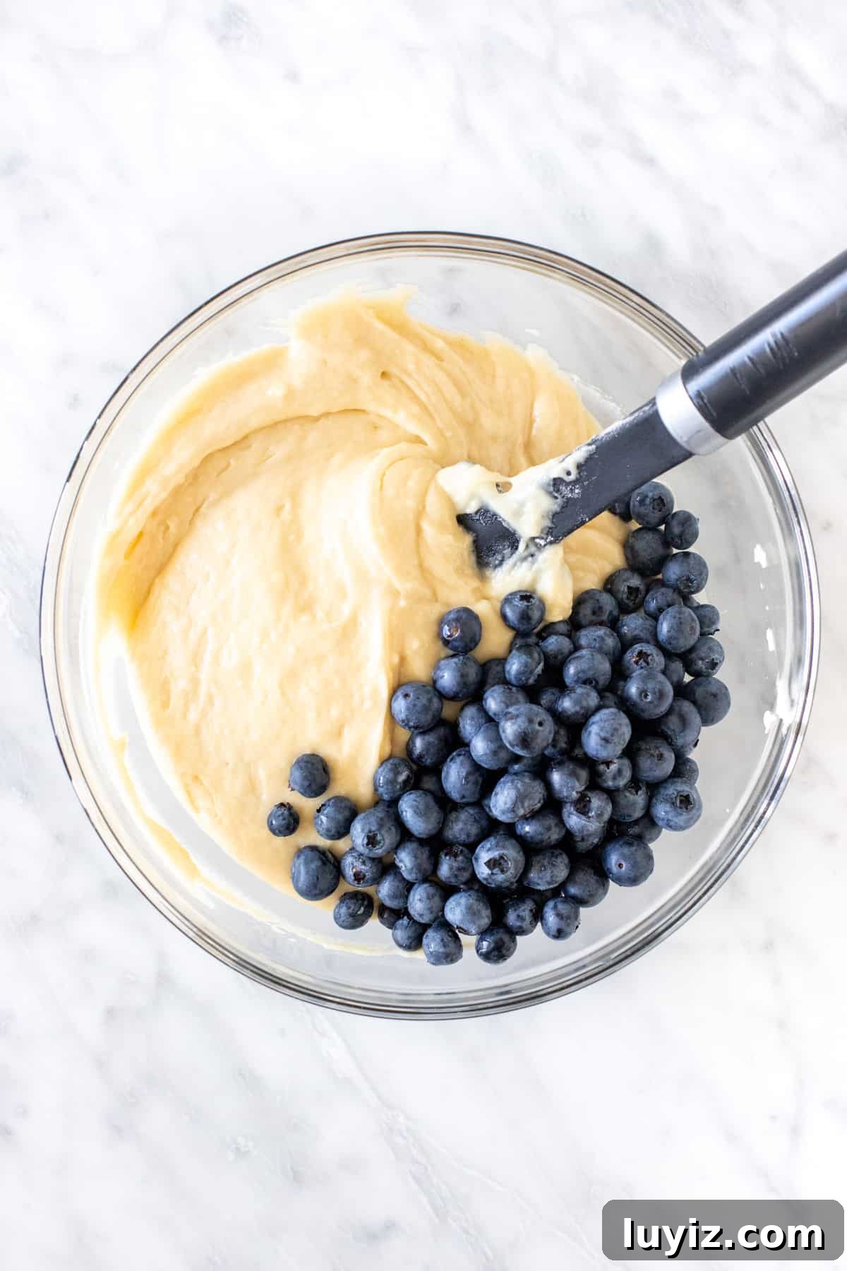 Quick Blueberry Muffins Recipe Ready in 30 Minutes 4 Bowl of muffin batter with blueberries