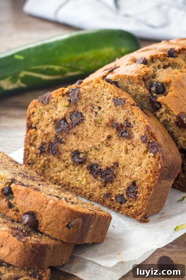 Chocolate chip zucchini bread is moist, tender and filled with chocolate chips.  Transform your garden zucchini into this delicious treat!