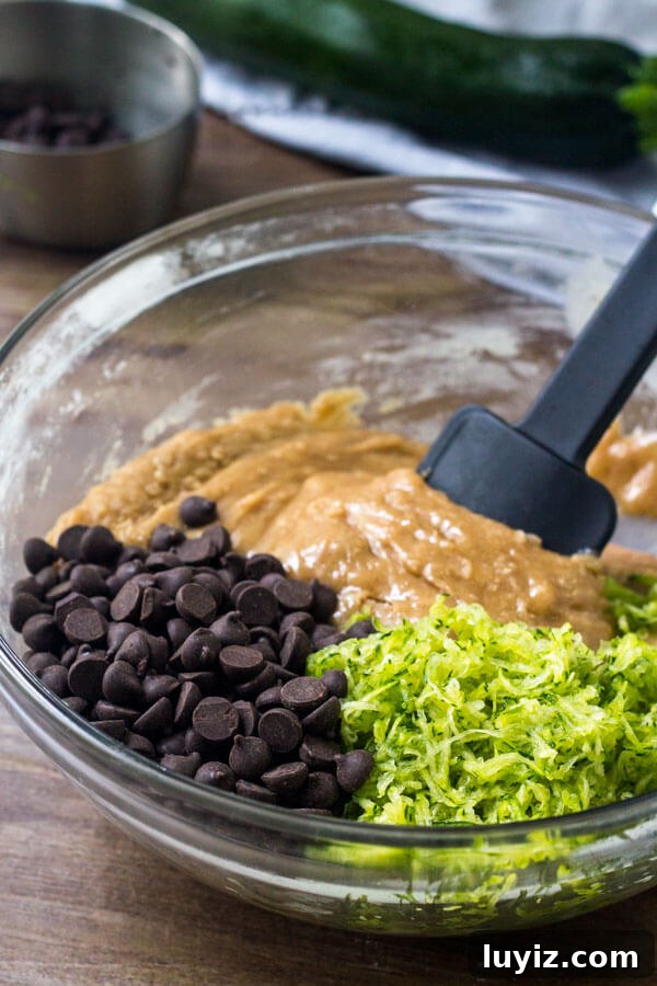Moist Chocolate Chip Zucchini Bread Recipe with Warm Spices 4 Chocolate Chip Zucchini Bread is extra moist thanks to the grated zucchini.