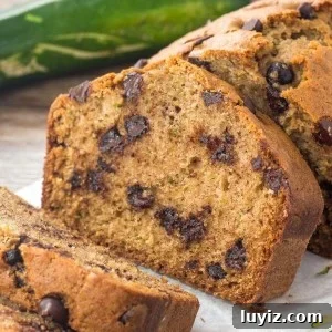 Chocolate chip zucchini bread is moist, tender and filled with chocolate chips.  Transform your garden zucchini into this delicious treat!