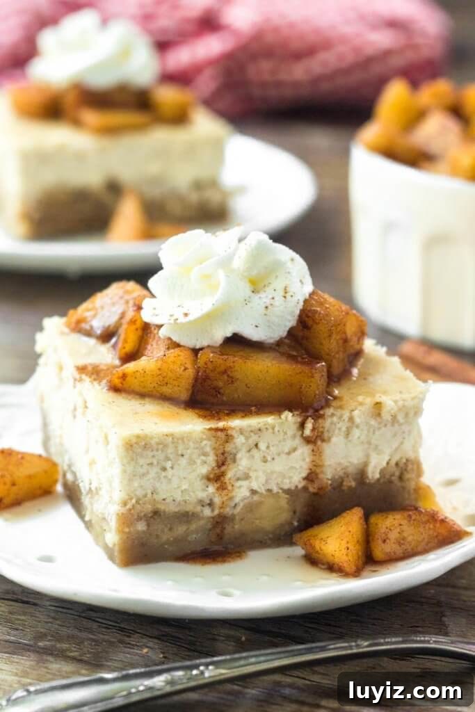 Apple Cheesecake Bars with Cinnamon Streusel Recipe 3 Apple cheesecake bars have an apple blondie base and cinnamon cheesecake layer