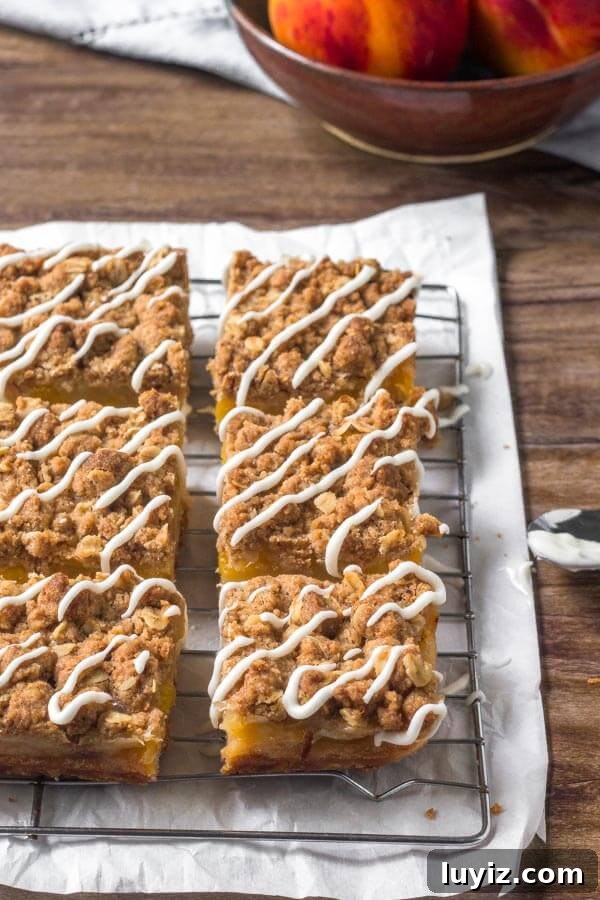 Peach Crumble Bars with Buttery Oat Streusel 5 Peach Pie Bars with an oatmeal crumble topping & vanilla glaze.