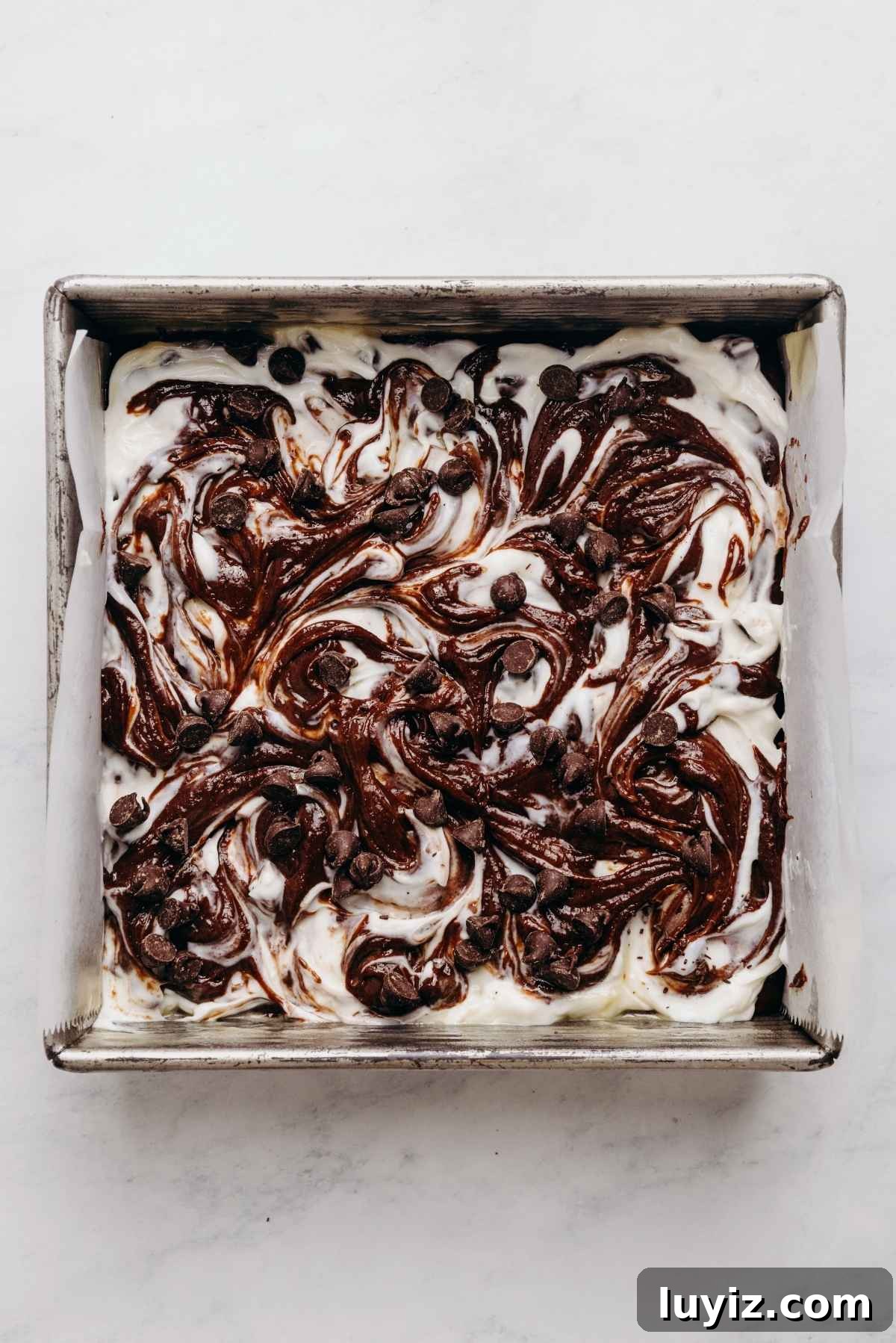Cream Cheese Swirled Chocolate Chip Brownies 15 Swirled cream cheese filling in brownie batter.