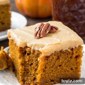 Moist pumpkin cake with caramel cream cheese frosting is so flavorful and perfect for fall.