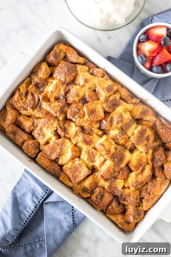 Make-Ahead French Toast Casserole for Brunch or Holiday Mornings 5 9x13 inch casserole pan of French toast casserole.