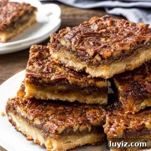 Decadent Pecan Pie Bars Recipe for Parties and Gifting 6 Easy pecan pie bars have a buttery crust, butterscotch flavor & tons of chopped pecans.
