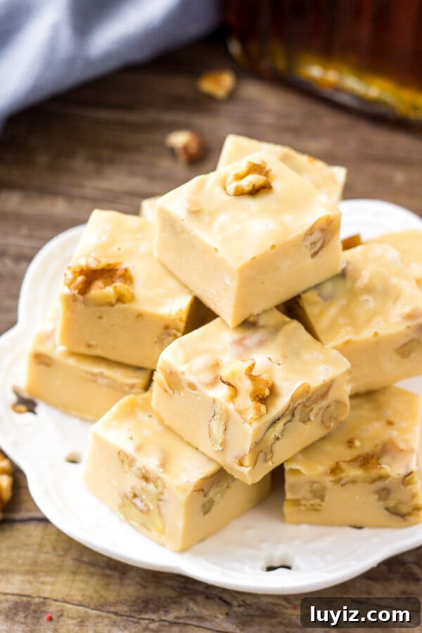 Maple Walnut Fudge Recipe — Decadent Homemade Candy 4 A plate of maple walnut fudge is the perfect easy Christmas candy recipe.