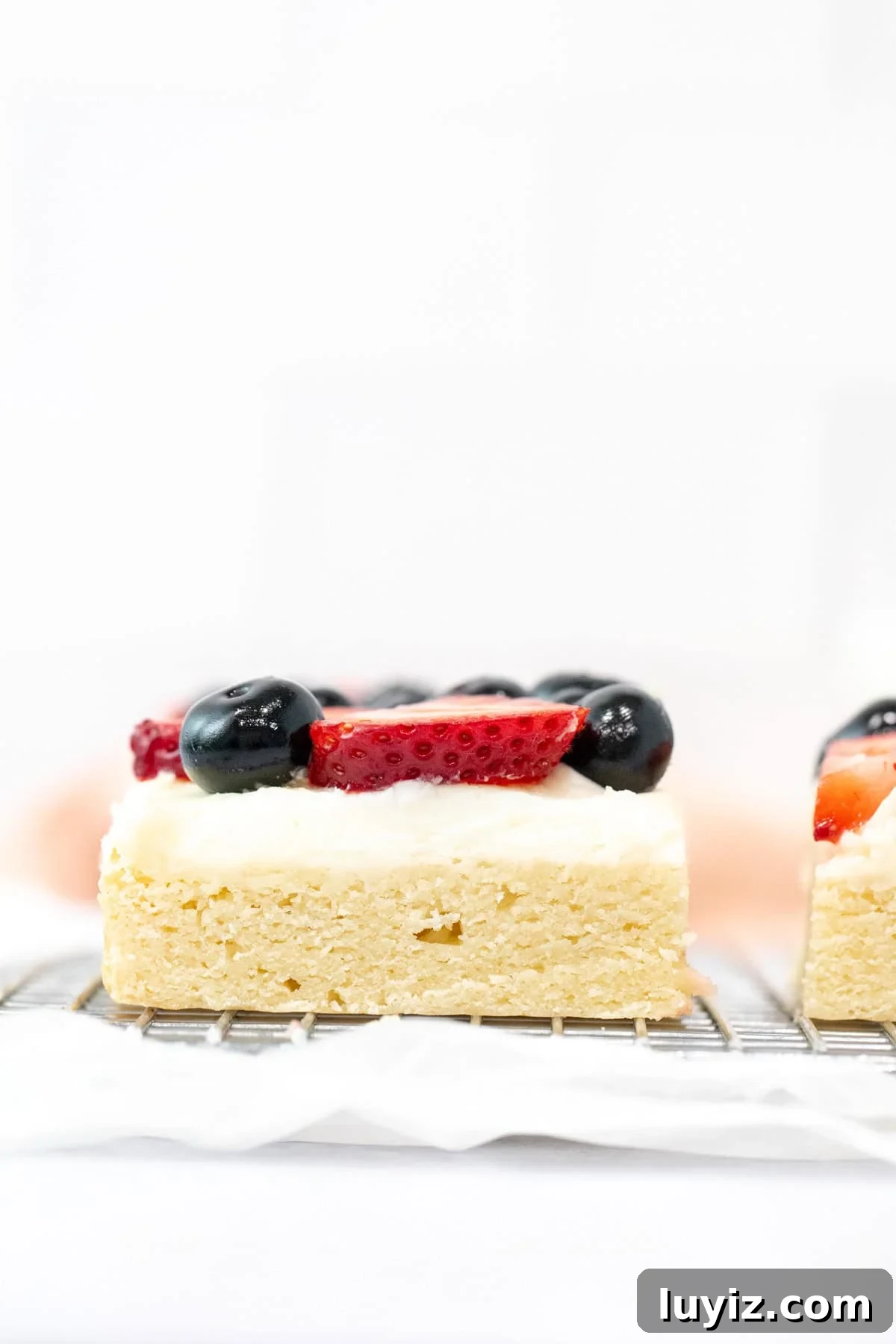 Berry-Topped Sugar Cookie Bars Recipe 2 Sugar cookie bar with berries on top