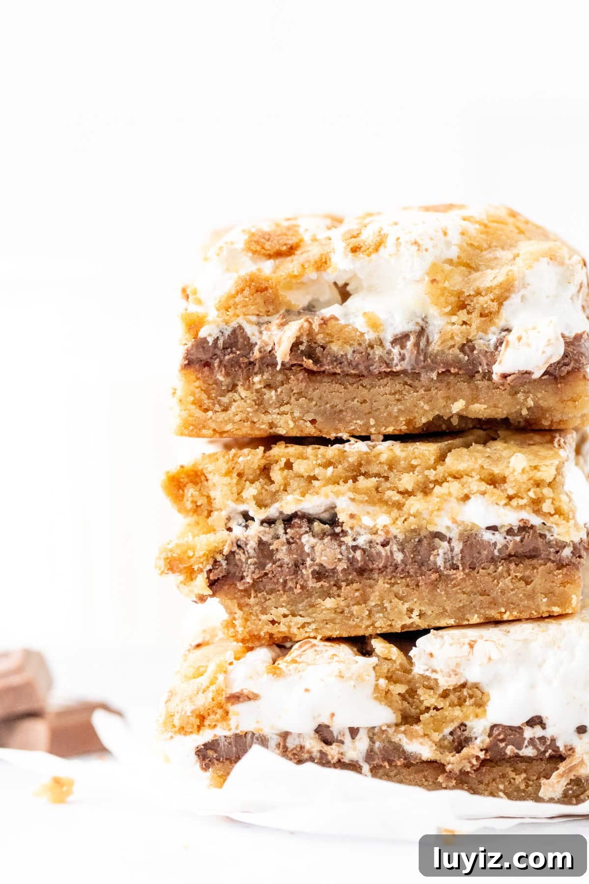 Stack of three gooey s'mores cookie bars
