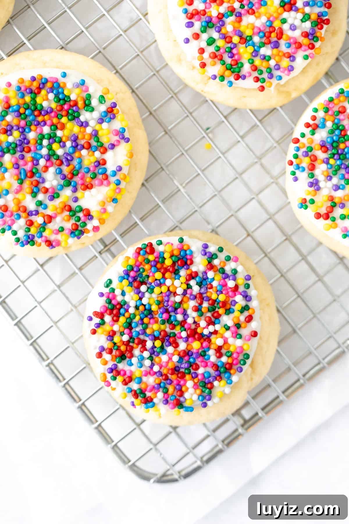 Dot cake cookies on a cooling rack