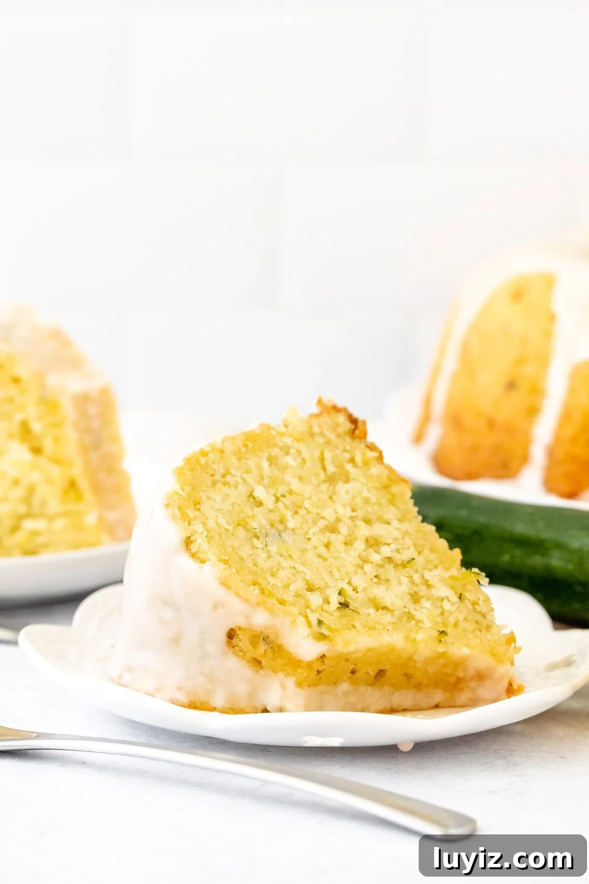 Moist Lemon Zucchini Cake with Lemon Glaze 8 Slice of lemon zucchini bundt cake