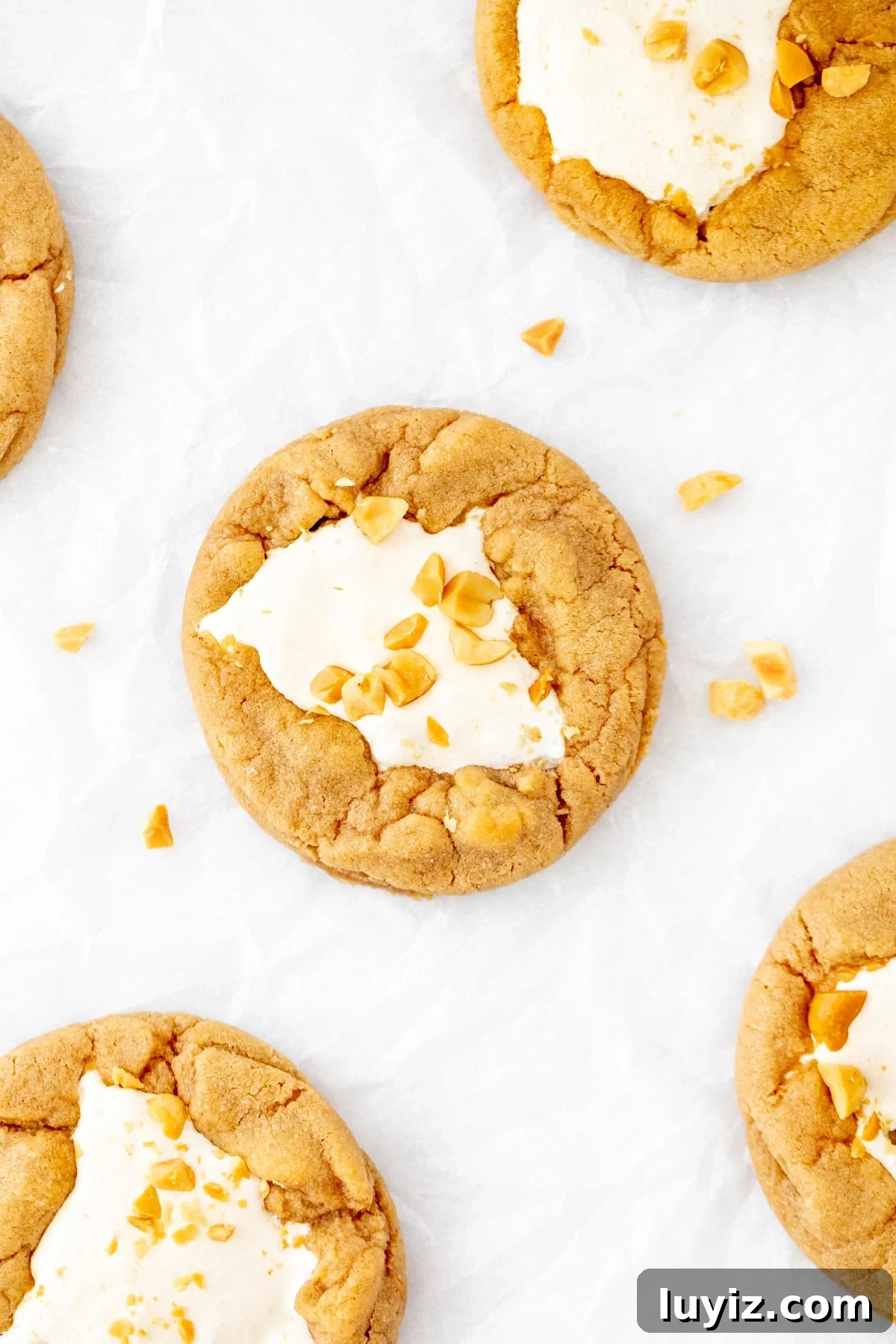 fluffernutter cookies with marshmallow fluff in the middle