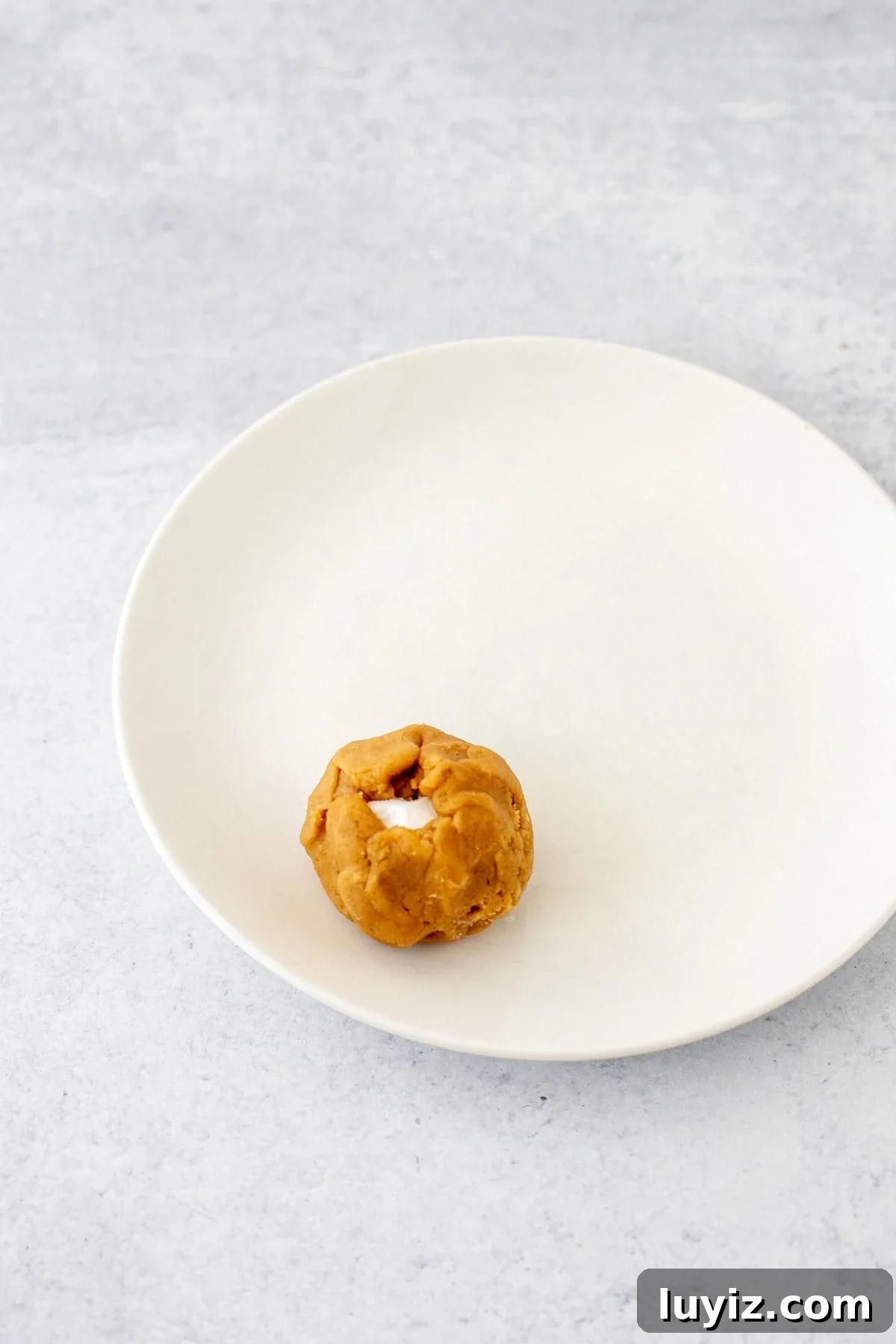 Fluffernutter cookie dough ball on a plate