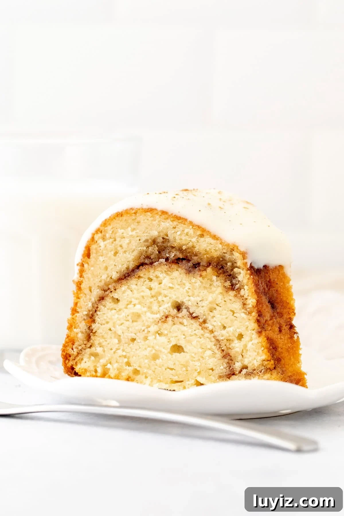 Cinnamon Swirl Bundt Cake with Cream Cheese Glaze 2 Slice of cinnamon swirl bundt cake